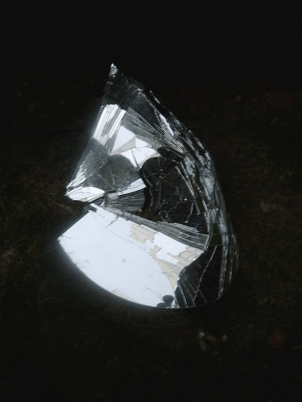 a found mirror sculpture