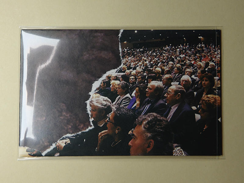 audience in front of a huge smoke cloud